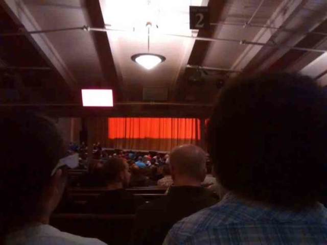 Our vantage point of the show. The gentleman to the right reminded me of Bob Ross, the painter.